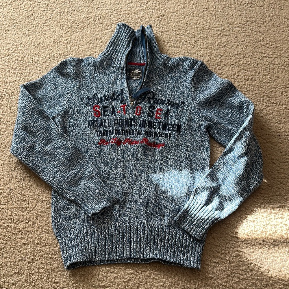 Stylish Gray Zip-Up Sweater with Red Accents